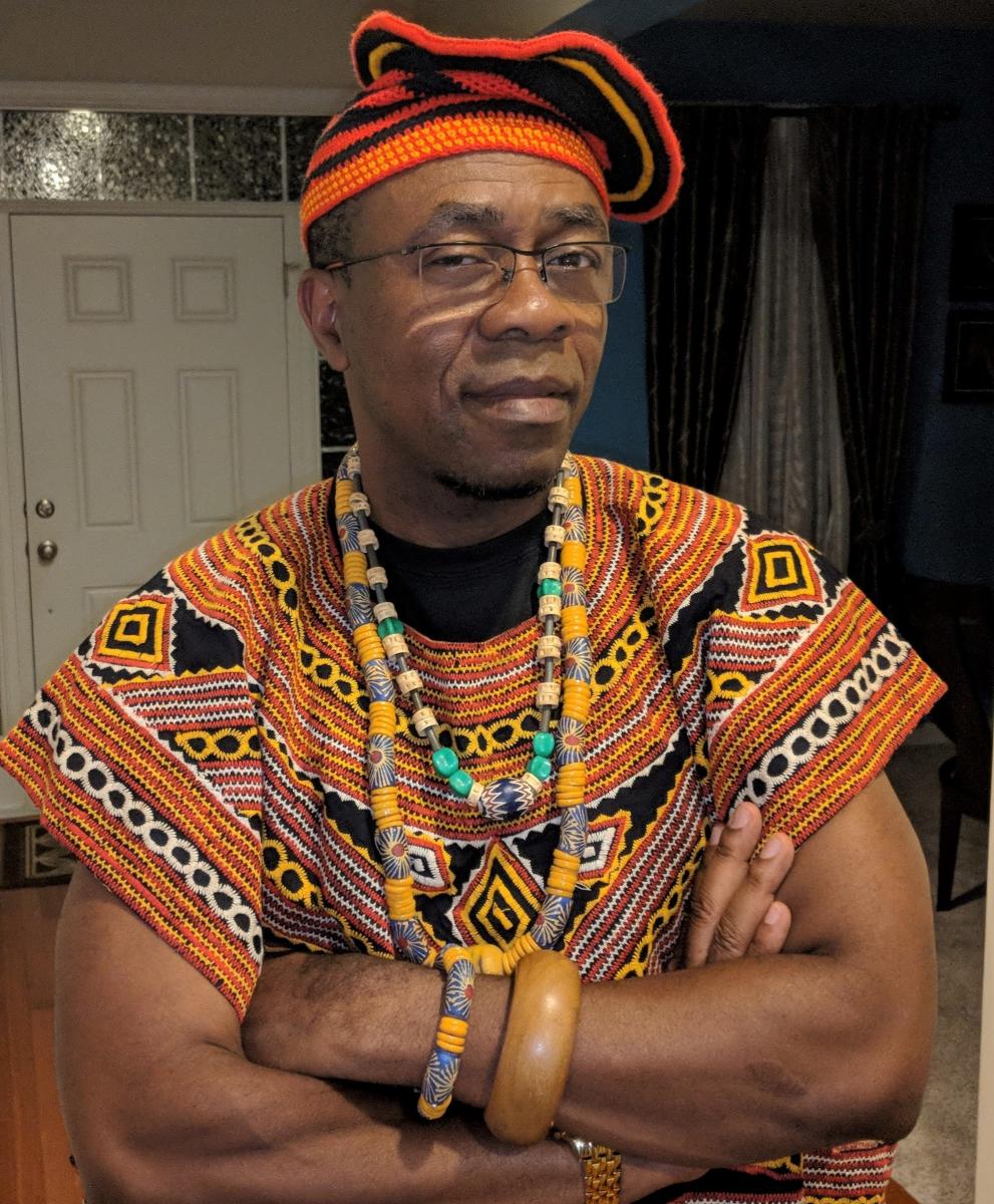 David Kenfack in traditional Cameroonian clothing.