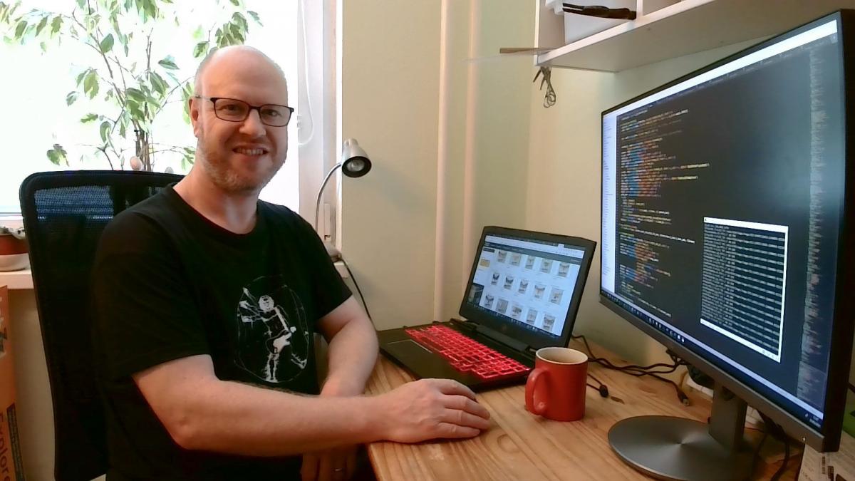 Phil Butterill photographed next to his computer.