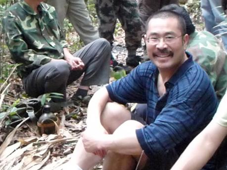 Fangliang He and colleagues in a tropical forest.